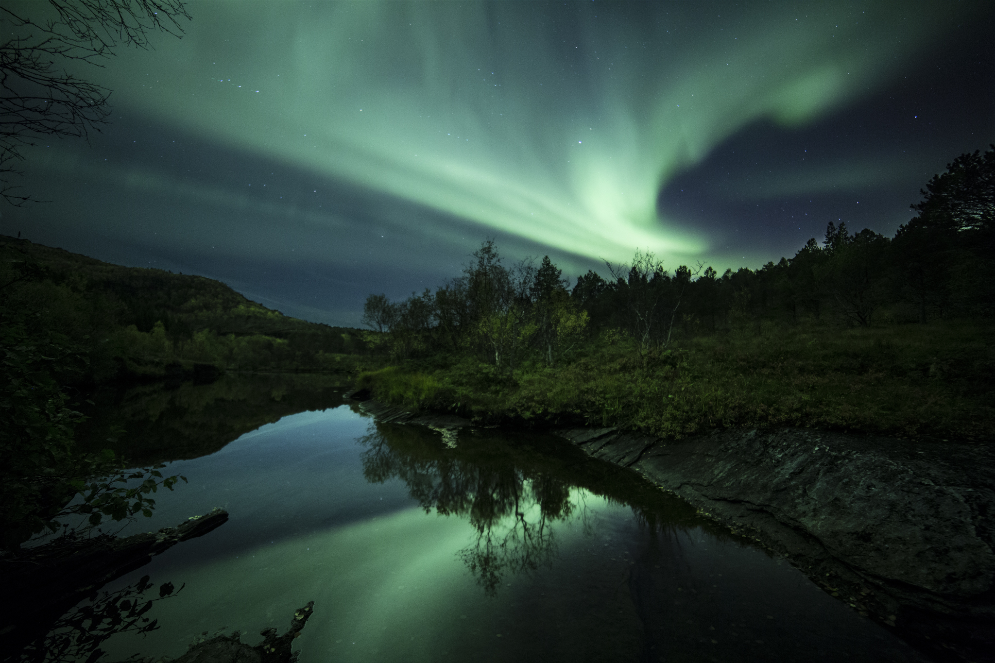 Northern Lights over a little lake in auutmn (c) Petter Formo