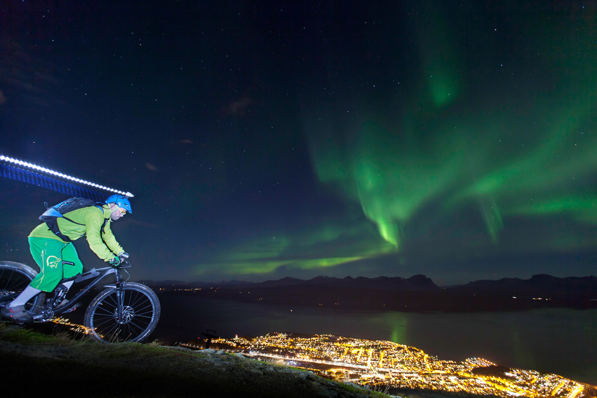 Cycling under the aurora above Narvik (c) Visit Narvik