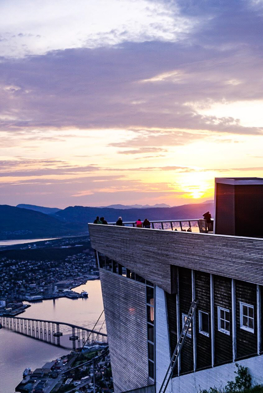 Midnight Sun in Tromsø, seen from the Upper Station of the Cable Car. Tromsø Bridge down below © Knut Hansvold