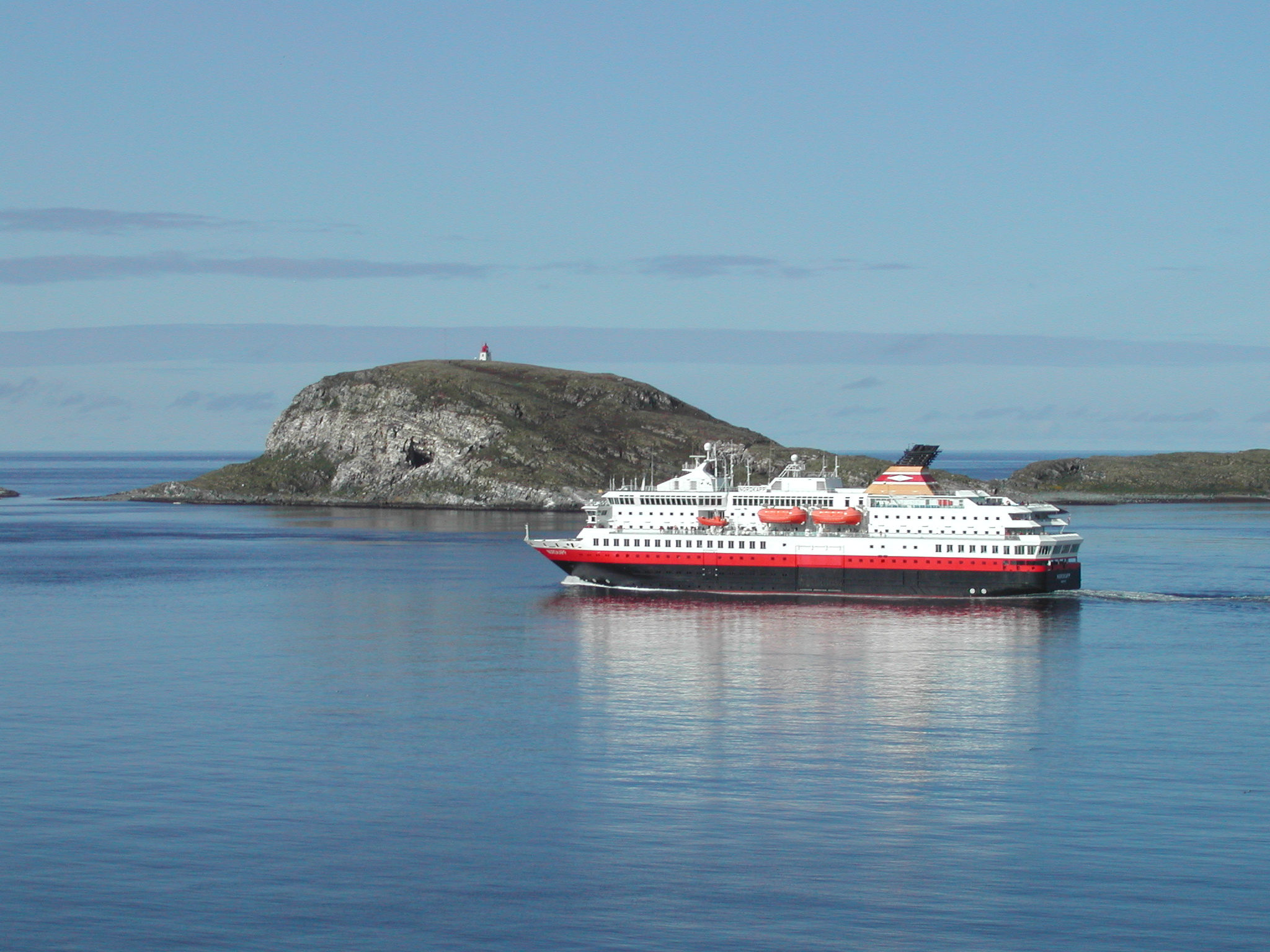The Hurtigruten passes right by Hornøya on its way to and from Vardø. It's not uncommon to see many of the birds either flying around or in the water as you pass by © Are Olaussen