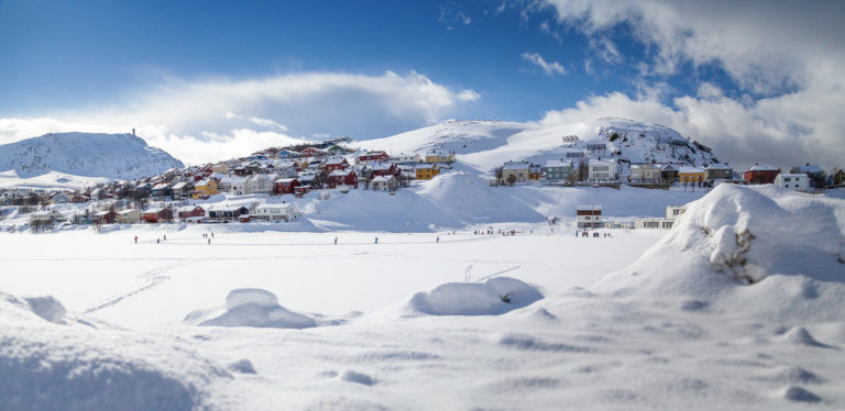 People out at Lake Storvannet, less than a mile out of Hammerfest downtown. The city mountain of Salen til the right, and afar to the left Mount Tyven © Ziggi Wantuch