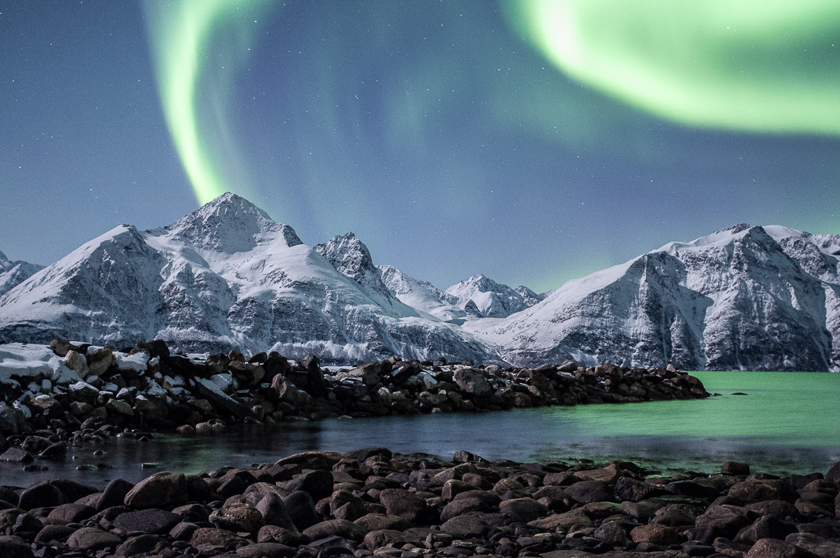White peaks and green Northern Lights a winter night on the Lyngenfjord © Lyngen North