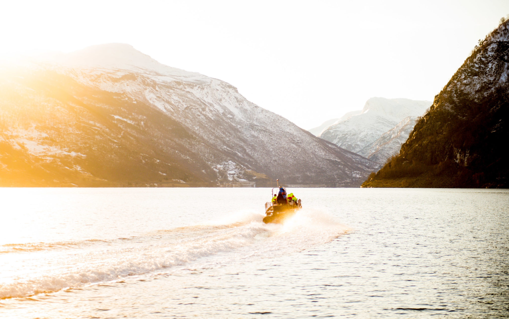 The low winter sun lends a golden hue to the fjord landscape © Fjord Norway