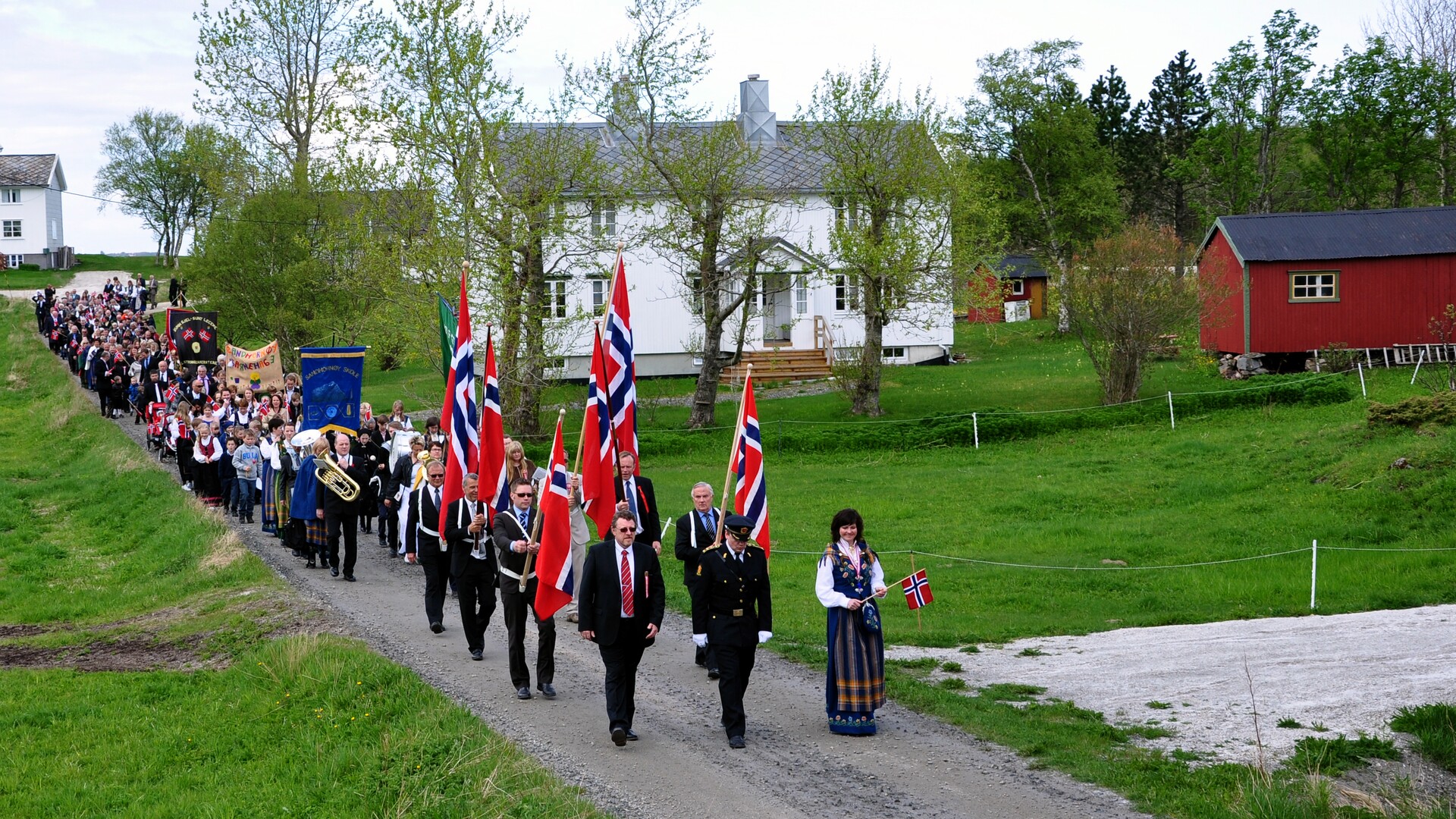 17th of May parade in Gildeskål, while trees and fields are getting green © Marit Elise Solbakken