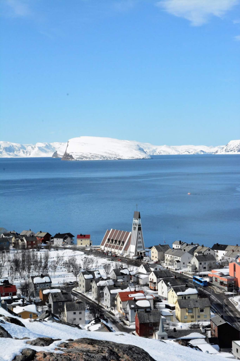 In April, there is still snow on the roofs in Hammerfest. But at daytime, the temperature is well above freezing, and nice to be outdoor © Knut Hansvold