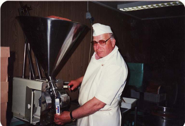 The father of the first Melbu caviar filling up the tube