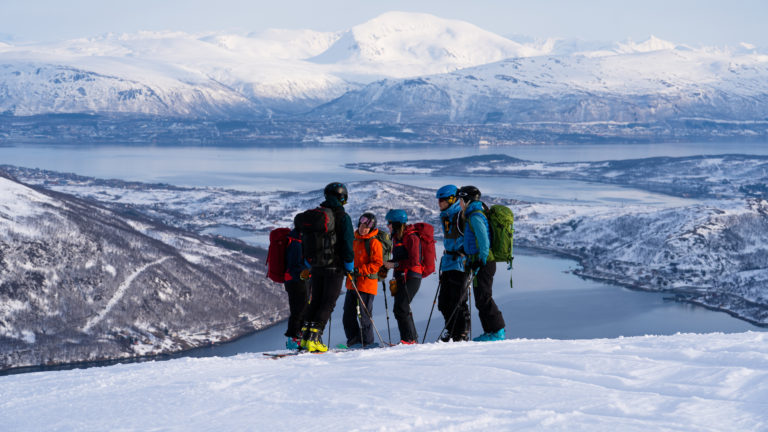 Heading up to Mount Buren with a certified guide. Parts of Tromsø are seen in the background. Photo: Lars Petter Jonassen / nordnorge.com