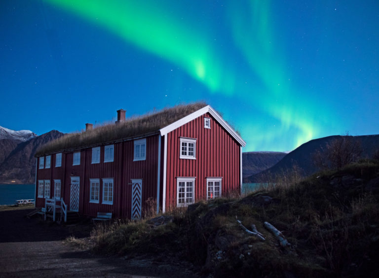 A late autumn night, there are northern lights over the 18th c. farmhouse © Jan Schmitt