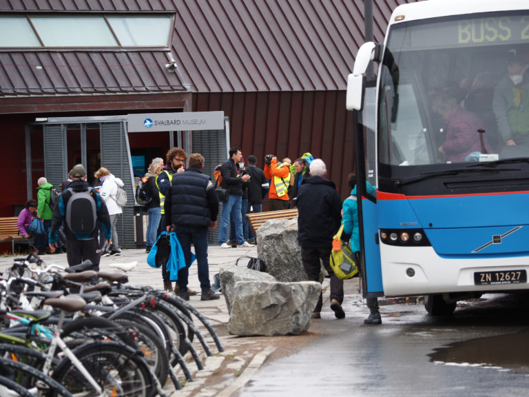The world's northernmost scheduled bus stopping at the Svalbard branch of the world's northernmost university © Visit Svalbard