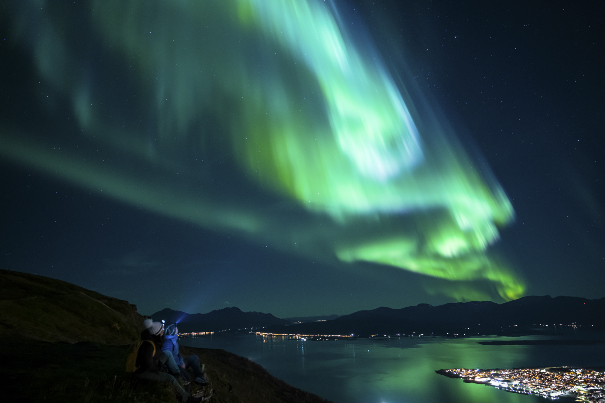 Look up - Northern lights performing a wild dance. © Martin Andersen