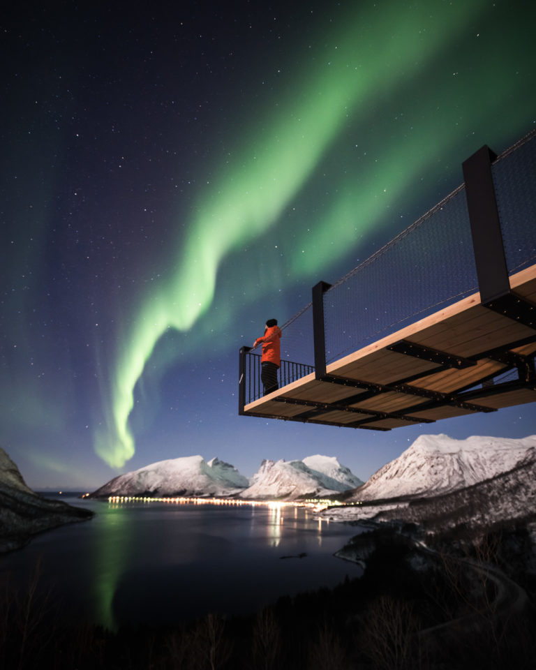 Northern Lights ribbons over the Bergsfjord, seen from "Magasuget" - the view platform overlooking the fjord © Kristoffer Vangen