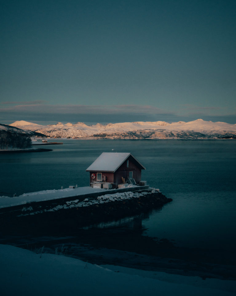 Light afar. Lysnes, Northern side of Senja Island. The winter light is fragile © Steffen Fossbakk