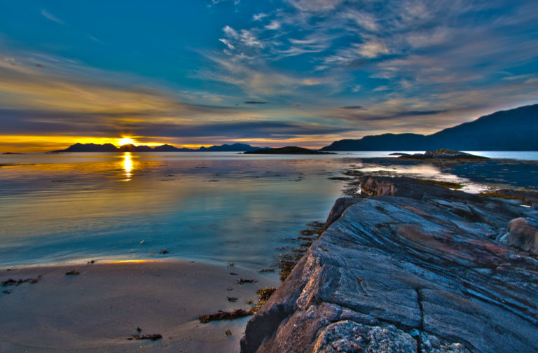 Midnight Sun over the fjords near Harstad © Stig Helgesen