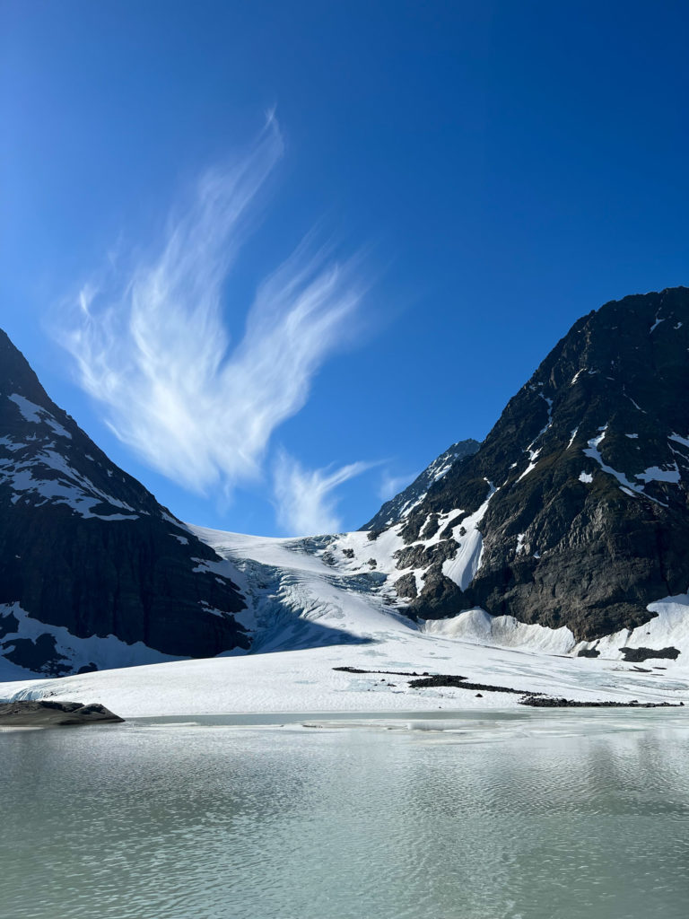 The glacier in early Summer, before this year's snow has melted completely. Steindalsbreen glacier in the Lyngen Alps © William Copeland