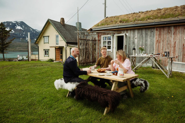 Coffee and cinnamon buns at the farm Nordsand gård at Sandsøy island near Harstad. A part of the shop is visible in front of the background wall, and more is found inside the Tinghuset ("courthouse") © Marita Eilertsen