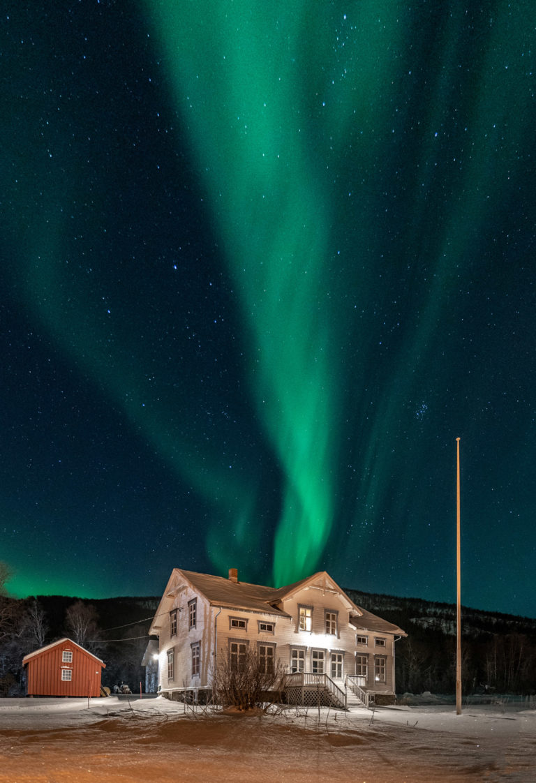 Northern Lights band over Lenvik vicarage, now the Lenvik museum © Dag Arild Larsen/Midt-Troms Museum