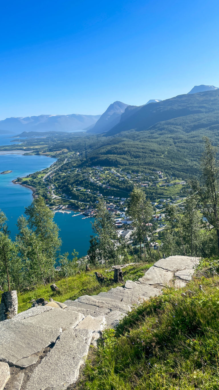 The Lyngen Alps fading into blue afar when climbing the Lyngentrappa stairs © Knut Hansvold