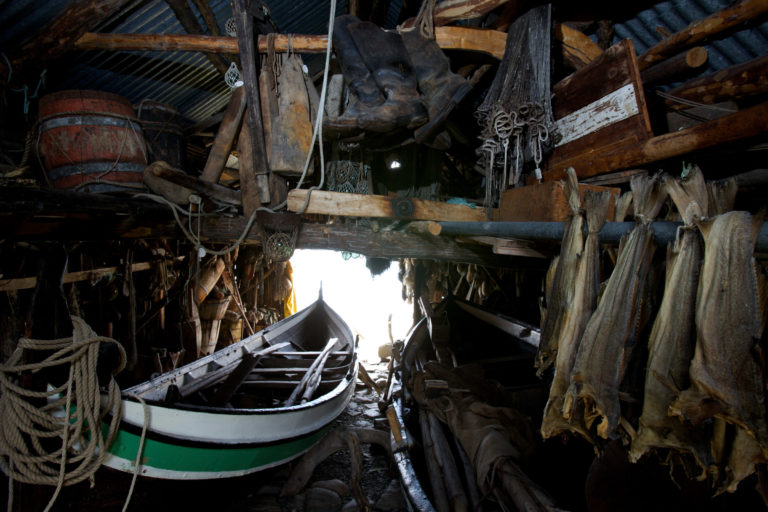 The boathouse - naust - is full of old boats, fishing gear and dried fish © Ola Solvang / Nord-Troms Museum