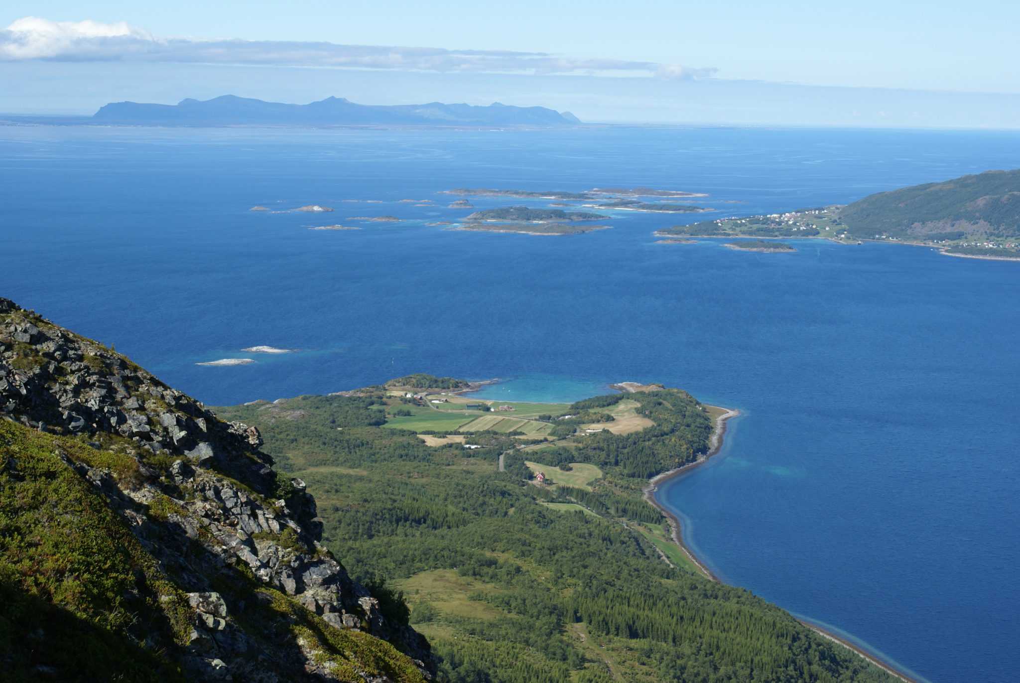 View from Mount Elgen down to Elgsnes, further out to Grytøya and on the far left the island of Andøya. You couldn't be more centrally located when all transport was by sea © Tore Ruud / Elgsnes