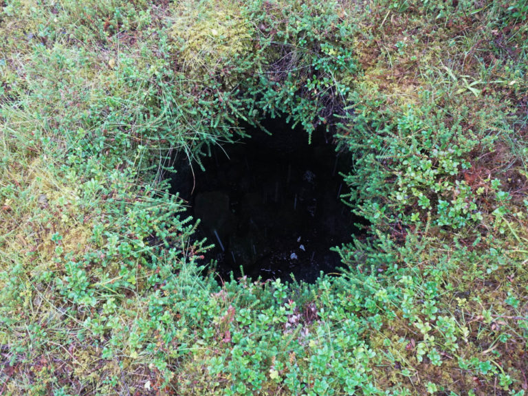 Glance down the hatch of a German WWII bunker at the Culture path Skallan - Rå, Kvæfjord © Knut Hansvold / NordNorsk Reiseliv