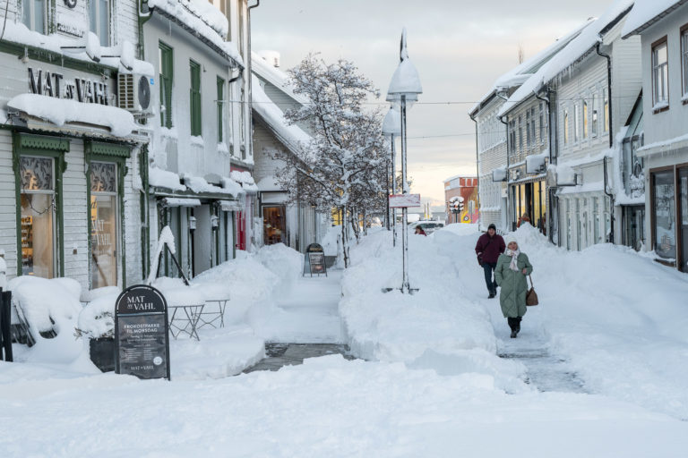 Snowed-down café tables in downtown Harstad after a heavy snowfall © Arne Widding