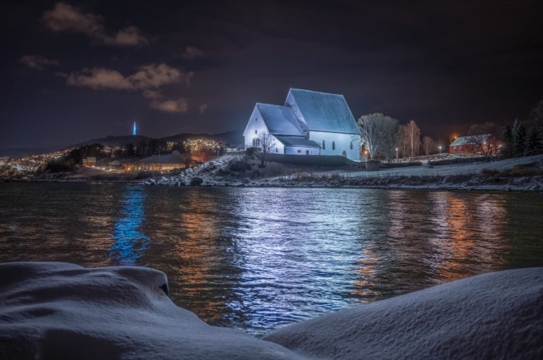 The church of Trondenes in Harstad on a cold winter evening © Arne Widding