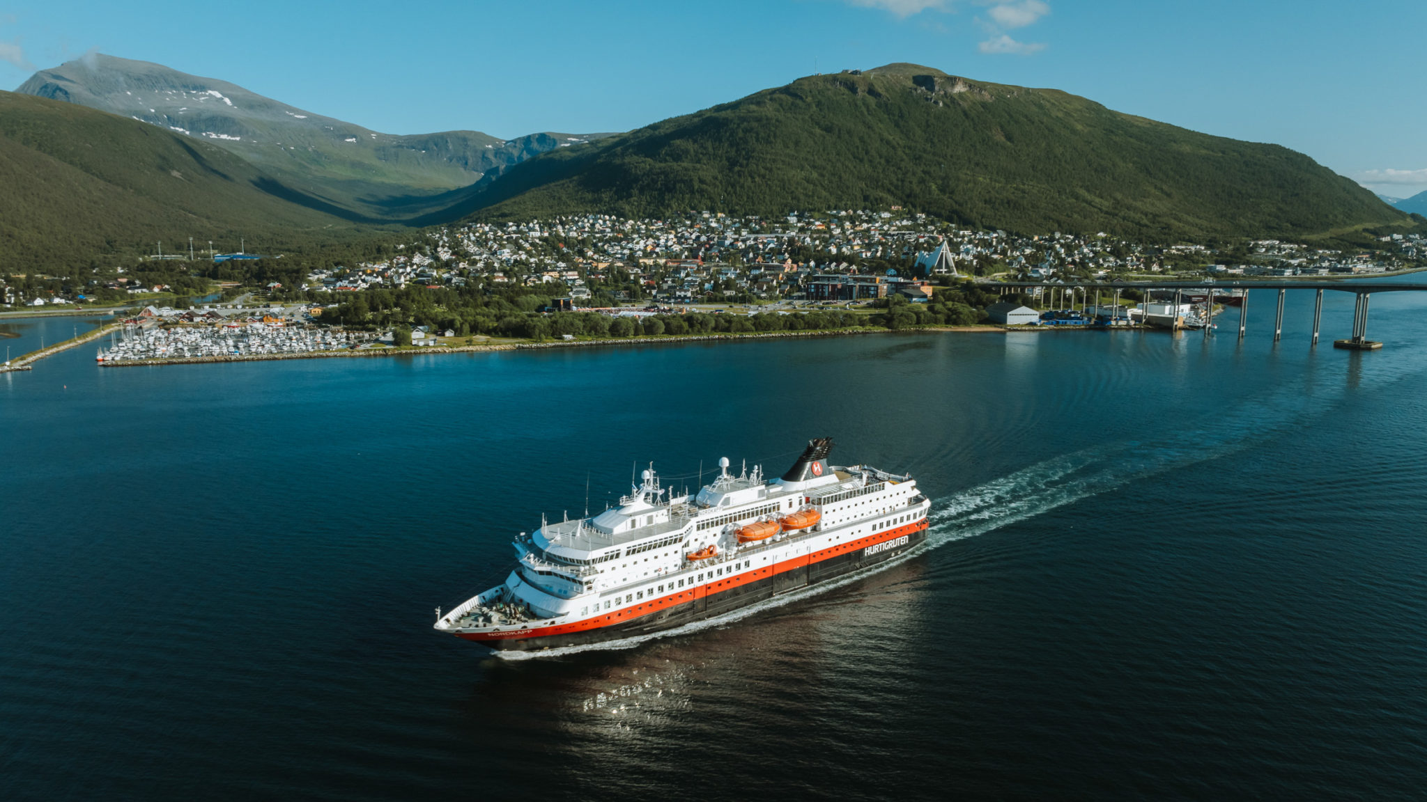 The northbound Hurtigruten sails towards the North Cape in glorious summer weather © Vegard Stien / Raw Studios