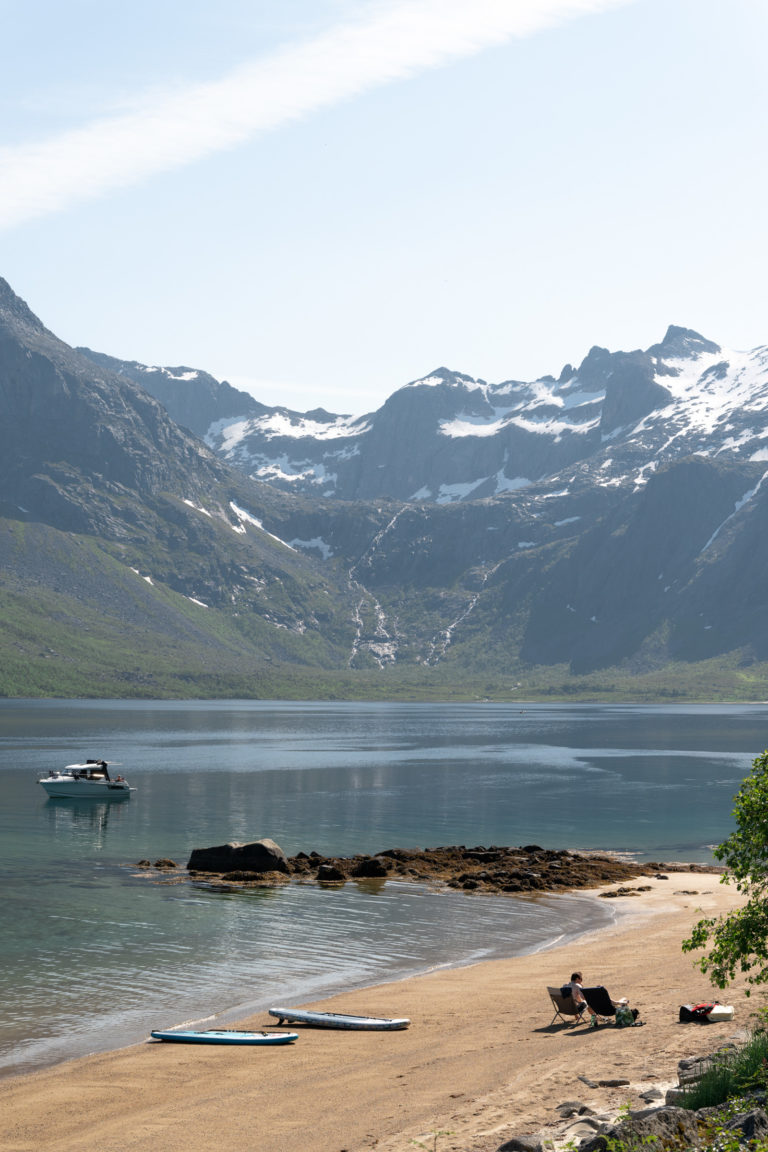 The small fjord arm Grøtfjord features sharp peaks and lovely beaches © Marie Nystad Helgesen