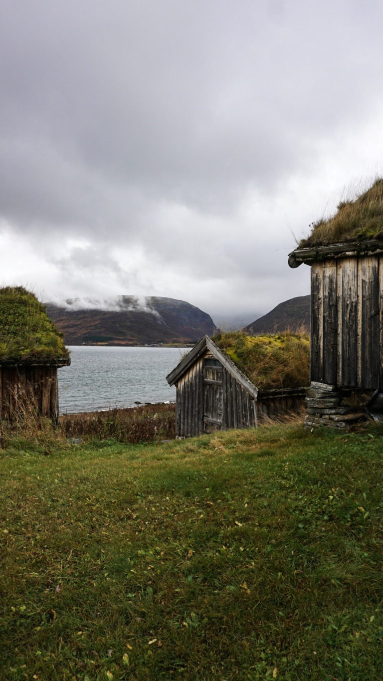 Outbuildings at Straumen farm with weathered grey timber © Knut Hansvold