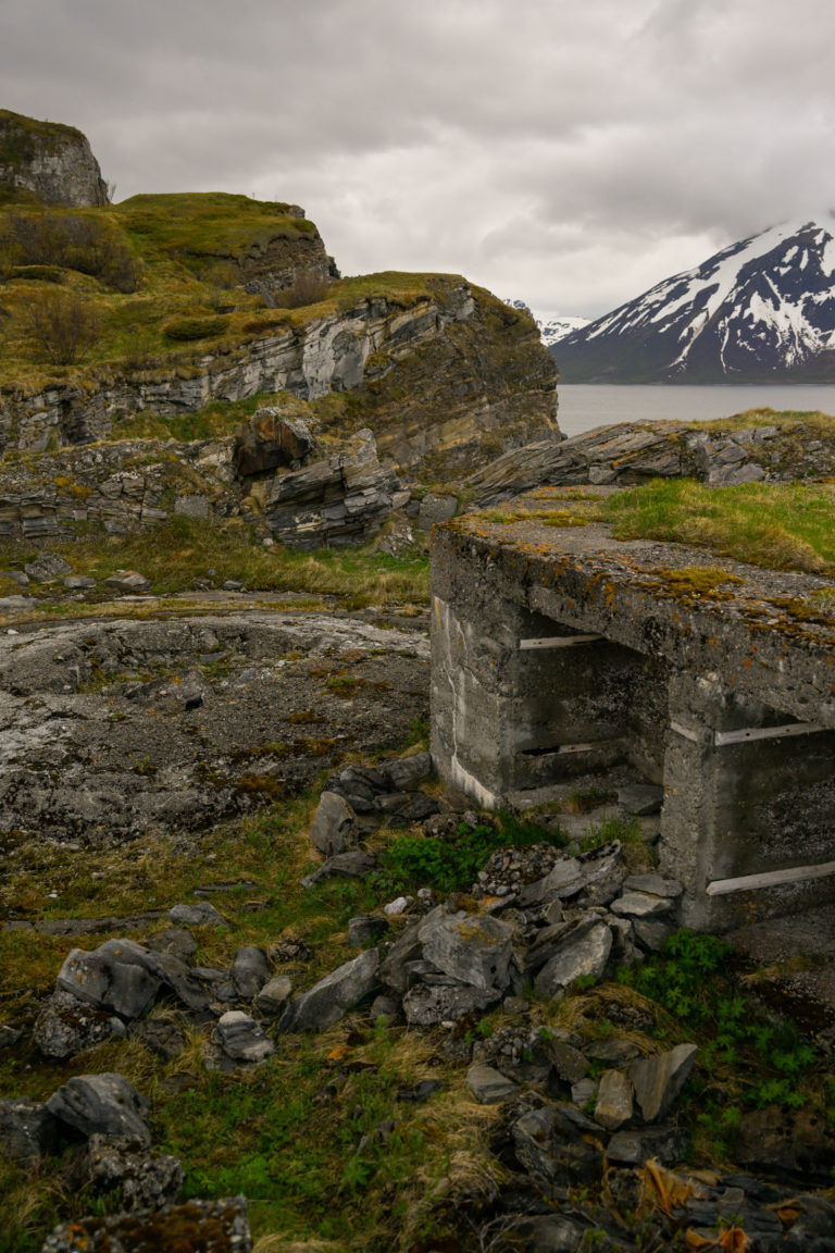 Gun emplacement and crumbling concrete at Engnes, with the Kågsundet waterway in the background © Knut Hansvold