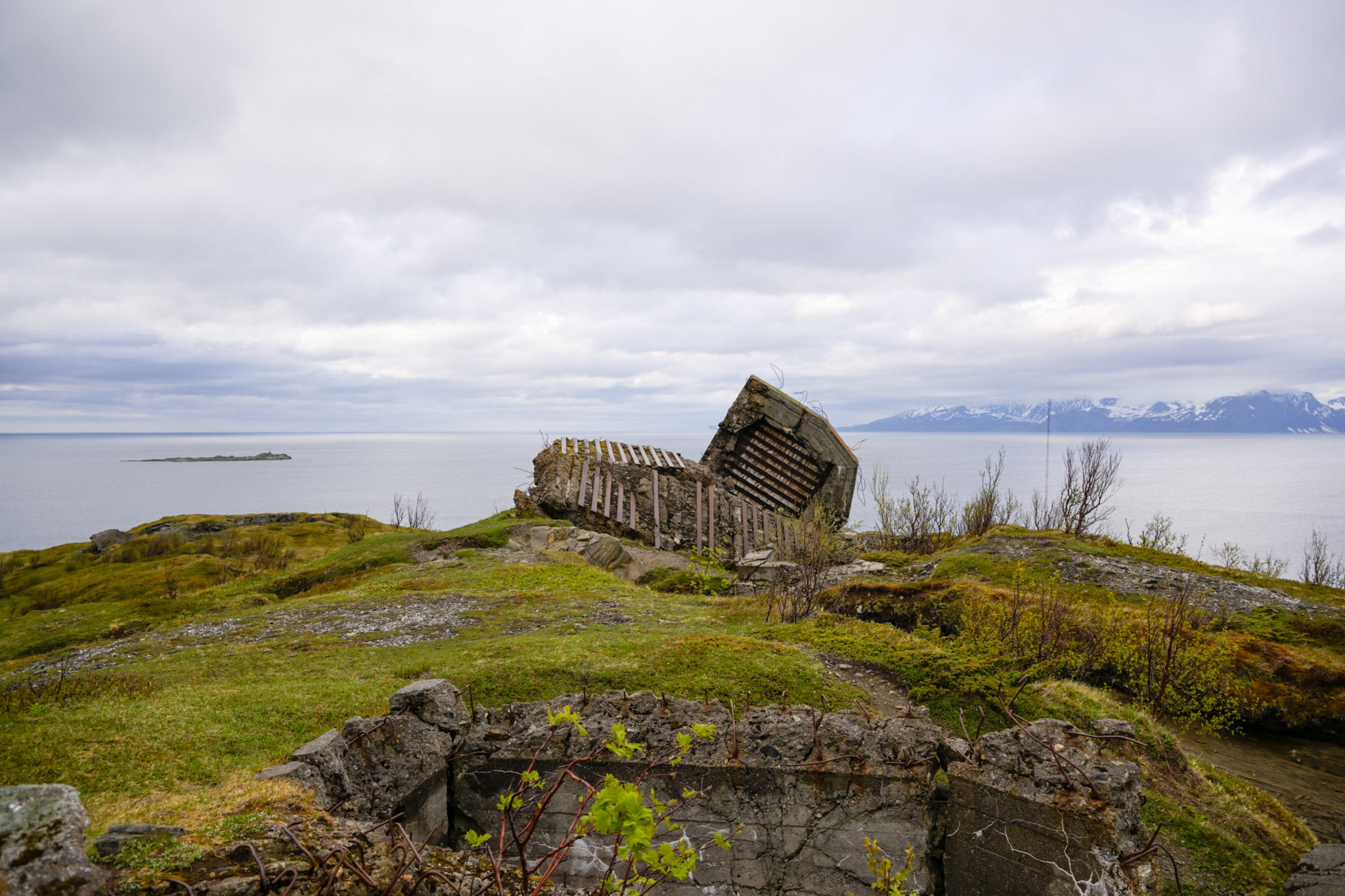 A sculptural bunker blown up against the vast coastal landscape of Northern Troms © Knut Hansvold