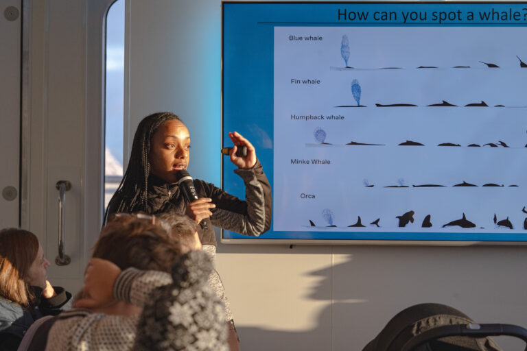 Which whales might we hope to encounter? We’re briefed as we head north from Tromsø © Brim Explorer