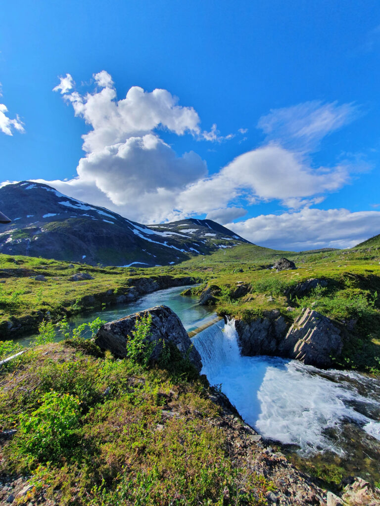 Even the river leading from Lake Isbuktvannet is green from the glacier water © Marja Utela